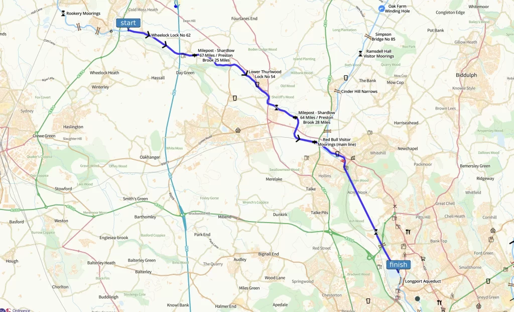 Route map showing a travel path between two locations, with labeled towns and roads. A blue line indicates the main route through a rural area, emphasizing waypoints along the journey.