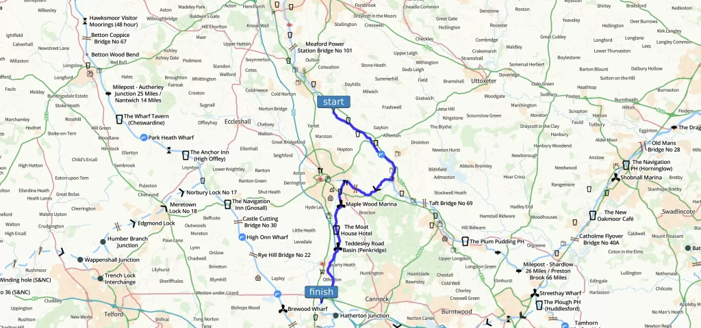 A map showing a route with a marked path in blue, connecting two points. The surrounding area features various place names and geographic details, indicating a rural landscape.